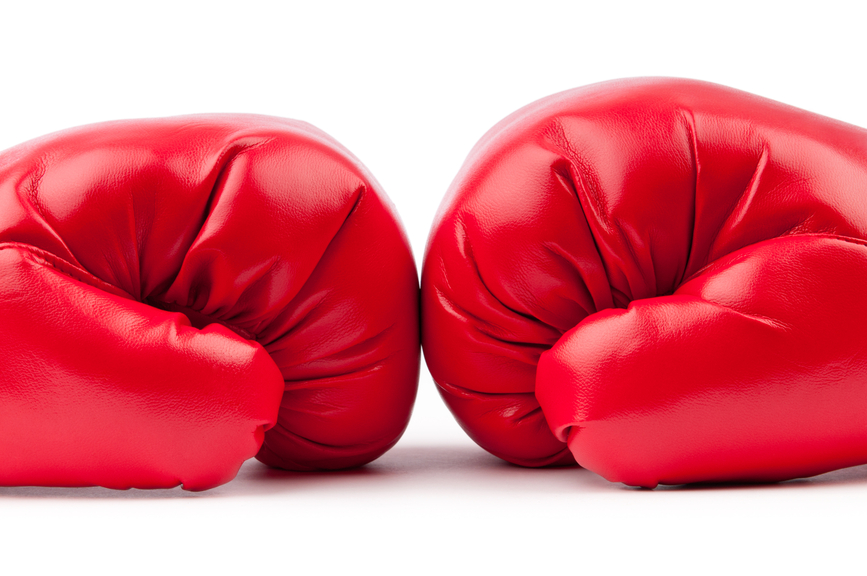 Red boxing gloves isolated on white